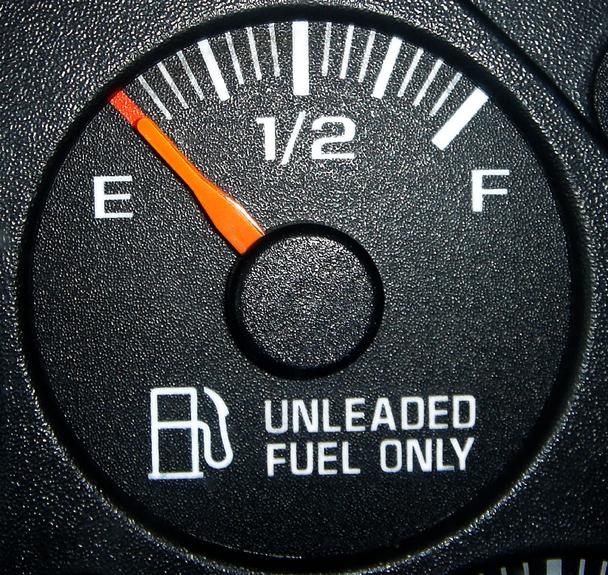 A gas tank fuel gage indicating the tank is empty iStock